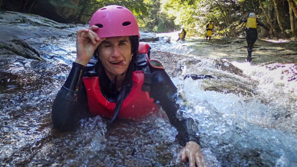 Hero canyoning tongue out