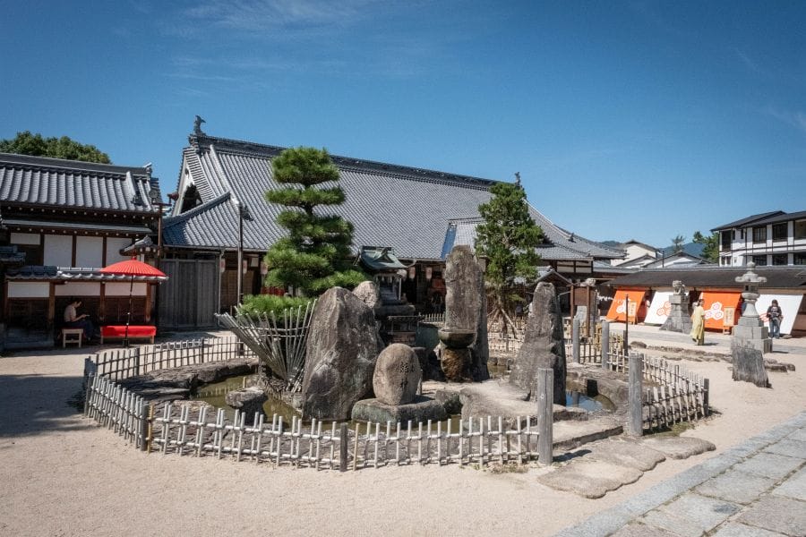 Miyajima Daigan-ji Temple fountain and pine tree